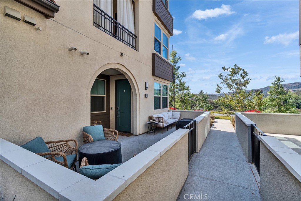 Oversized first floor patio overlooking the green lush hills - 1200 Lasso 105, Rancho Mission Viejo CA 92694 - photo 1