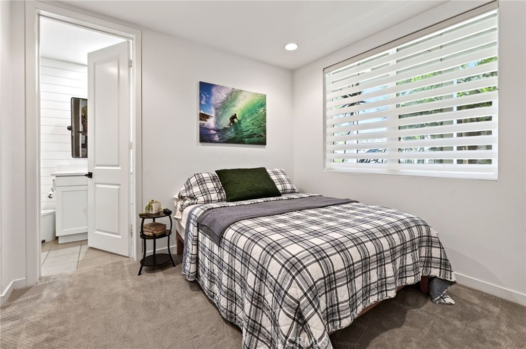 Downtairs bedroom with private full bathroom. - 14 Marisol, Rancho Mission Viejo CA 92694 - photo 12