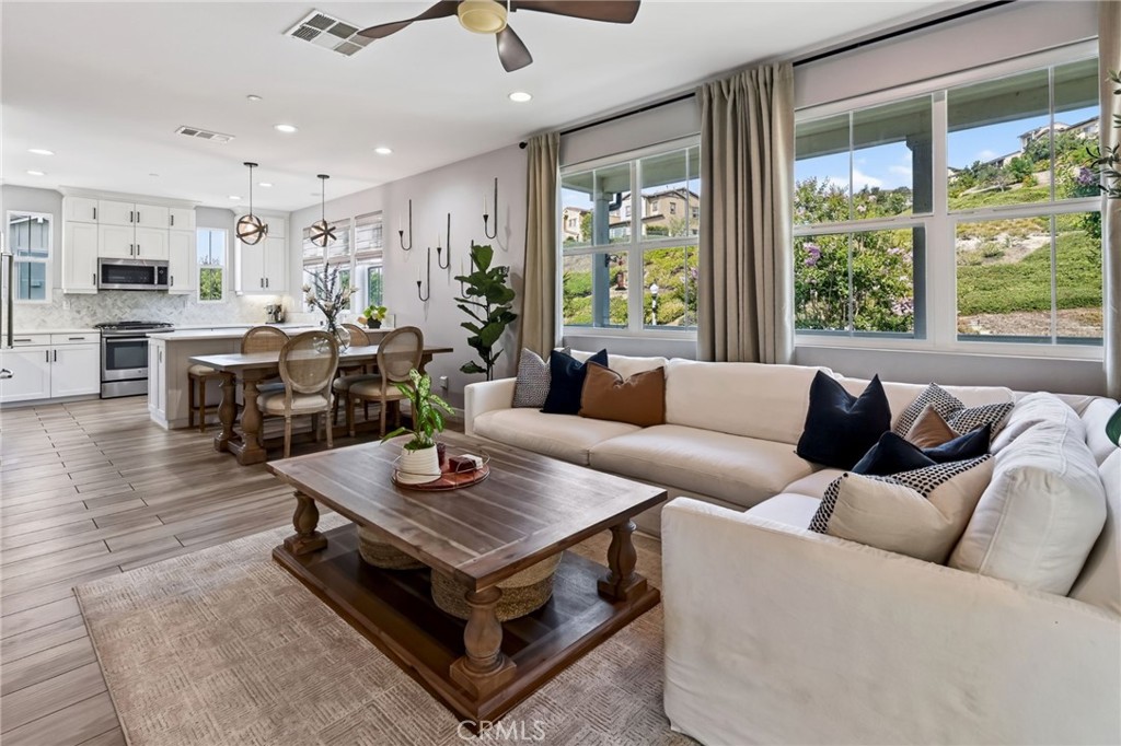 Family Room and Kitchen have windows that look out at the beautiful hills. - 14 Marisol, Rancho Mission Viejo CA 92694 - photo 14