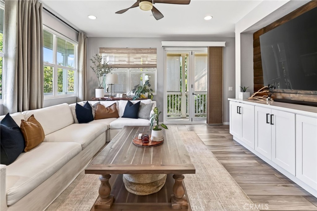 View of the family room and entrance to the outdoor wraparound porch. - 14 Marisol, Rancho Mission Viejo CA 92694 - photo 17