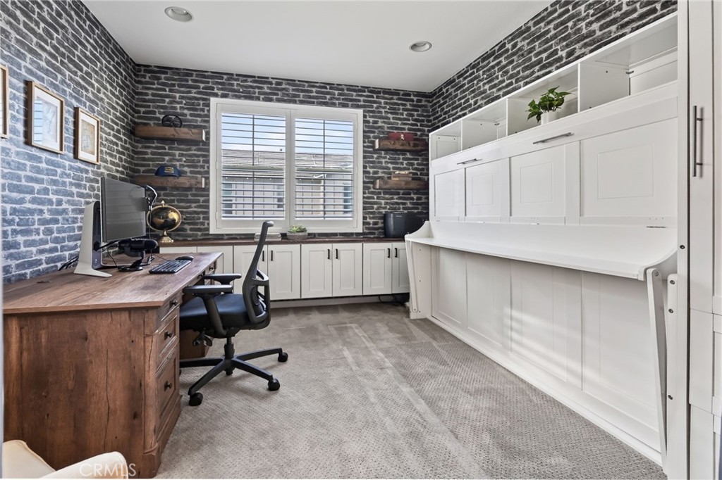 This bedroom can double as an office with its Murphy Bed and built in closet. - 14 Marisol, Rancho Mission Viejo CA 92694 - photo 30