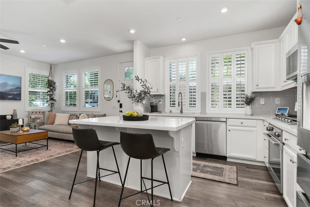 Breakfast Bar/Kitchen Island open to Family Room - 171 Natal, Rancho Mission Viejo CA 92694 - photo 3