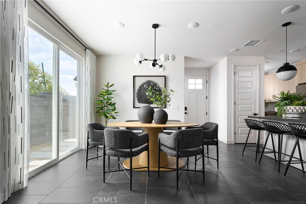 Model Photos: Photos shown are of the model home for this floor plan. Actual finishes, features, and landscaping may var - 1733 Scarlett Road, Rancho Mission Viejo CA 92694 - photo 3