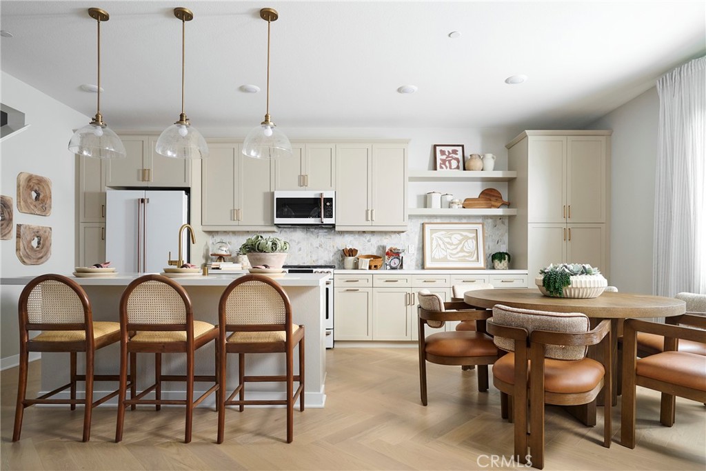 Model Photos: Photos shown are of the model home for this floor plan. Actual finishes, features, and landscaping may var - 1739 Scarlett Road, Rancho Mission Viejo CA 92694 - photo 7