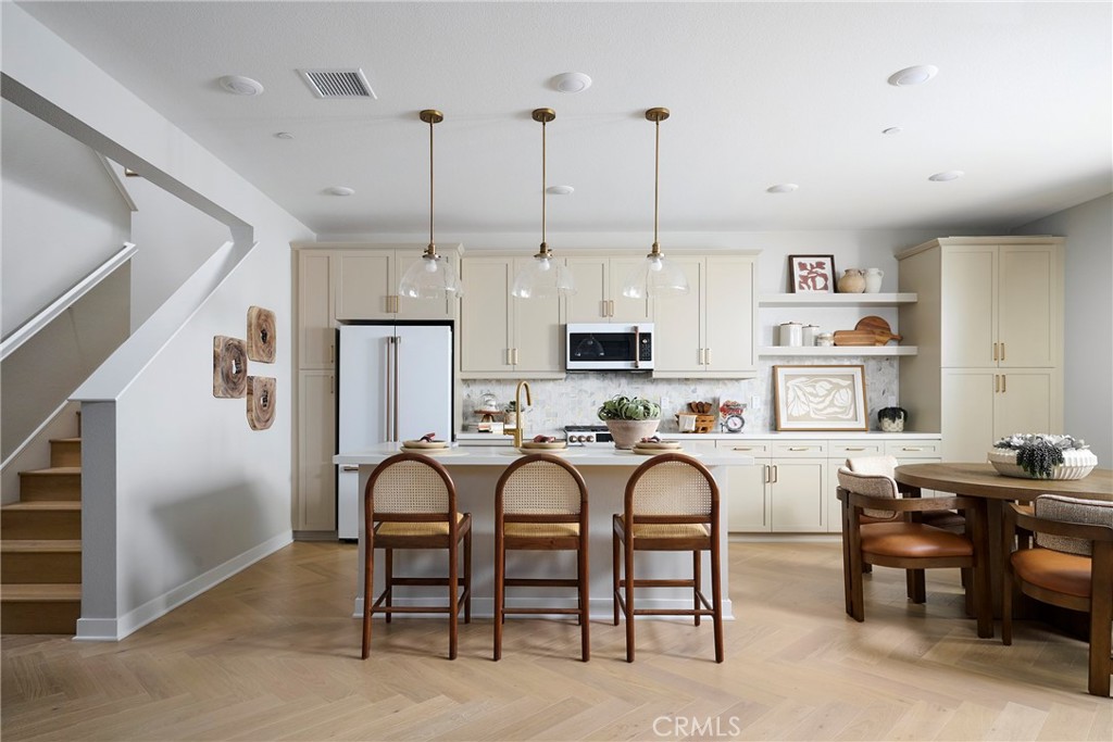 Model Photos: Photos shown are of the model home for this floor plan. Actual finishes, features, and landscaping may var - 1751 Scarlett Road, Rancho Mission Viejo CA 92694 - photo 5