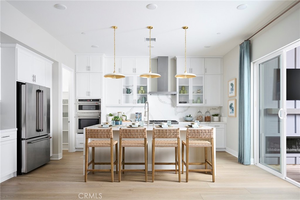 Photos shown are of the model home for this floor plan. Actual finishes, features, and landscaping may vary. - 255 Renewal Road, Rancho Mission Viejo CA 92694 - photo 2