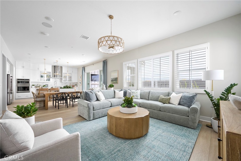 Photos shown are of the model home for this floor plan. Actual finishes, features, and landscaping may vary. - 255 Renewal Road, Rancho Mission Viejo CA 92694 - photo 5