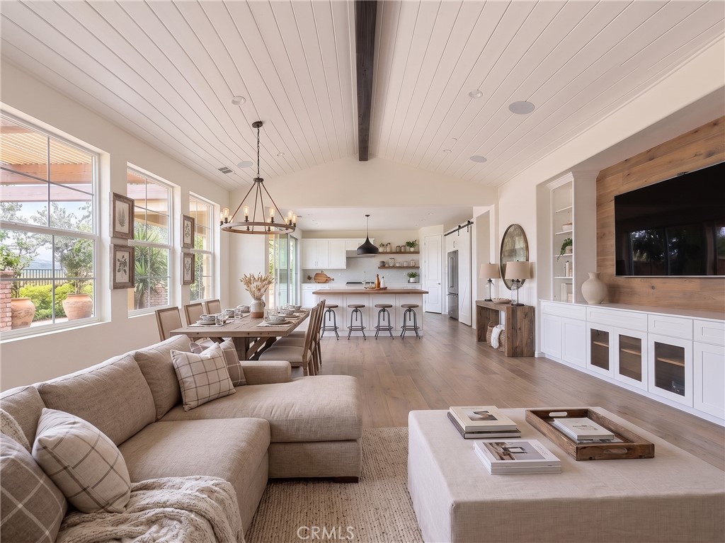 Living room toward kitchen. Virtually staged - 31 Garcilla Drive, Rancho Mission Viejo CA 92694 - photo 4