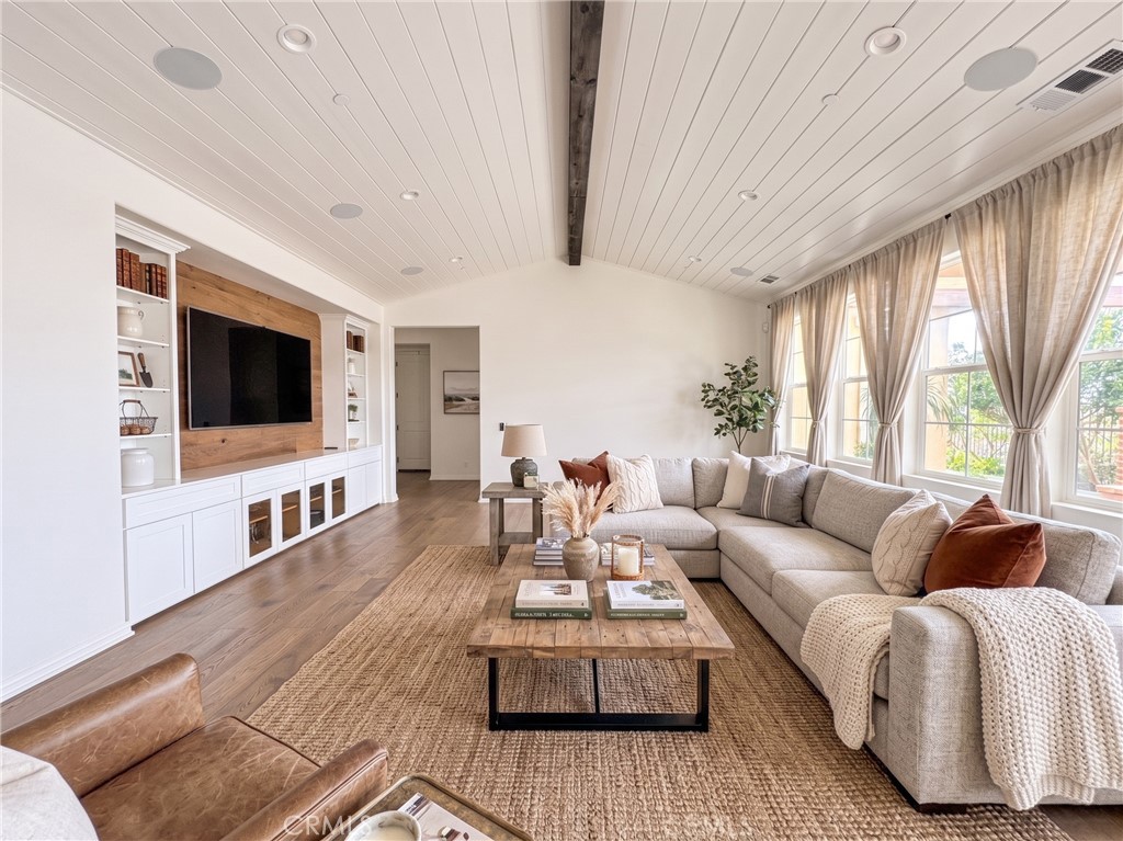 Living room, reverse view. Virtually staged - 31 Garcilla Drive, Rancho Mission Viejo CA 92694 - photo 6