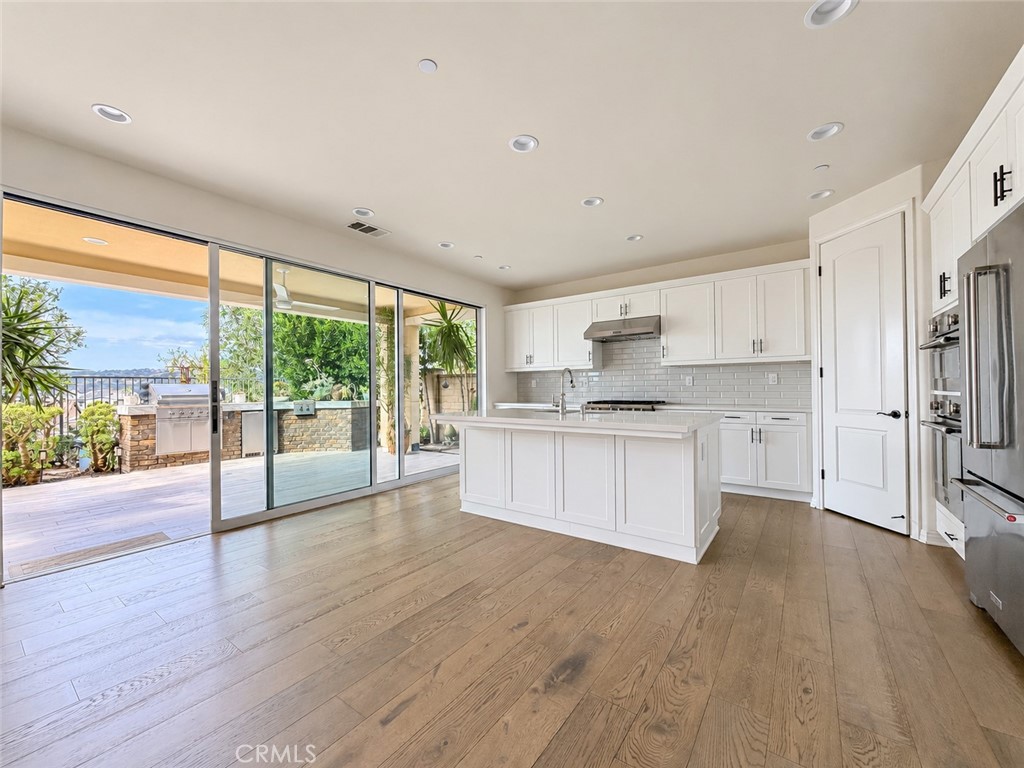 Kitchen toward patio. - 31 Garcilla Drive, Rancho Mission Viejo CA 92694 - photo 9