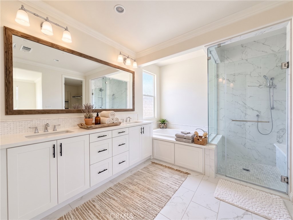 Primary bathroom. Virtually staged with - 31 Garcilla Drive, Rancho Mission Viejo CA 92694 - photo 21