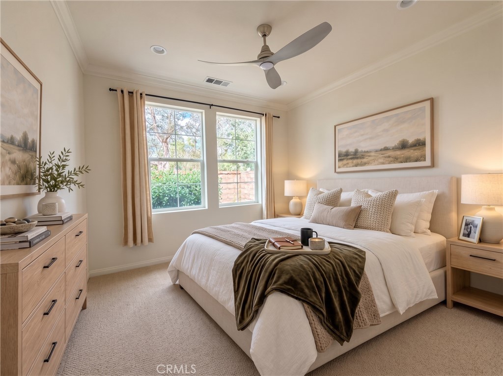 Secondary bedroom, window view. Virtually staged with furniture and decorative accessories digitally added. Enhanced unf - 31 Garcilla Drive, Rancho Mission Viejo CA 92694 - photo 25