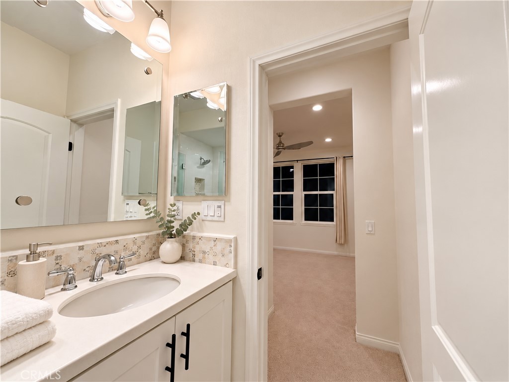 Bathroom toward secondary bedroom. virtually - 31 Garcilla Drive, Rancho Mission Viejo CA 92694 - photo 27