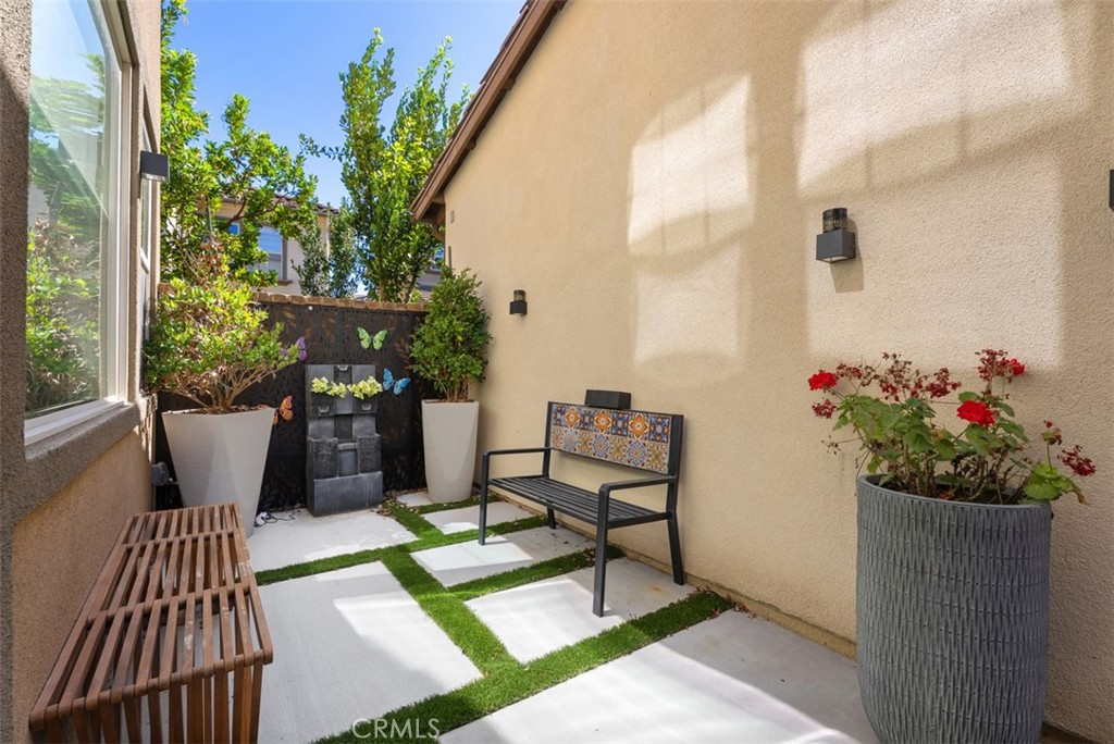 The fenced courtyard extends your living space outdoors with room for conversation, container gardens, or al fresco dini - 33 Lomada Street, Rancho Mission Viejo CA 92694 - photo 17