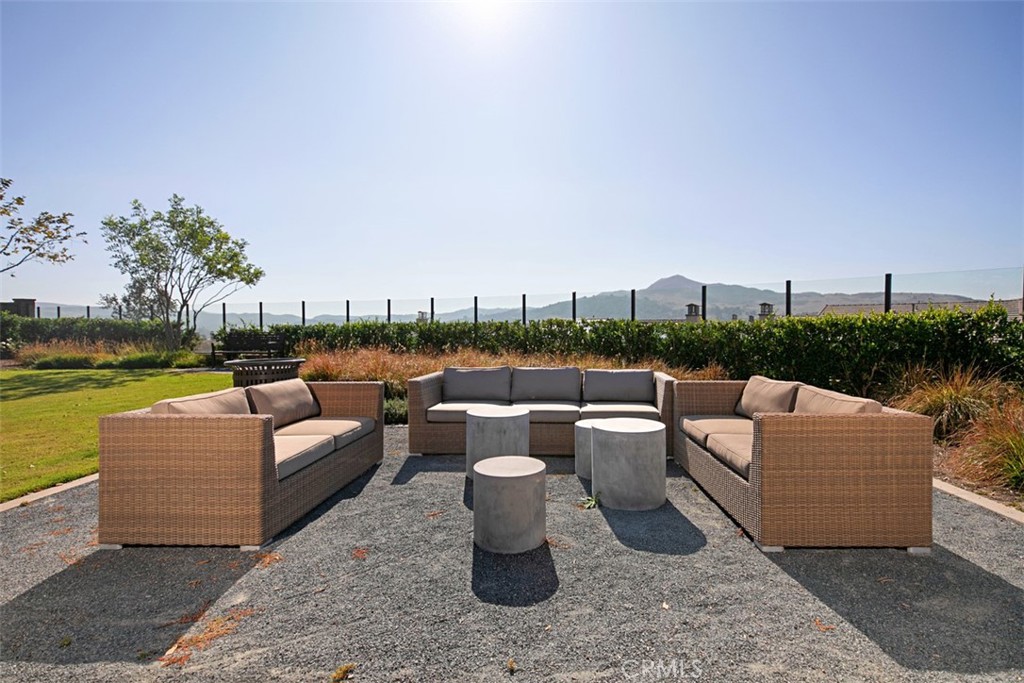 Thoughtfully designed outdoor lounges provide the perfect place to unwind, connect with neighbors, or simply enjoy South - 33 Lomada Street, Rancho Mission Viejo CA 92694 - photo 30