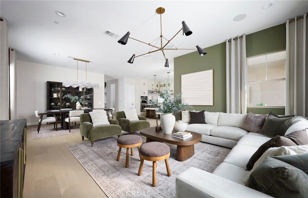 Photos uploaded are of the model representing the floor plan and are to demonstrate furniture layout. Furniture pictured - 541 Corkscrew Road, Rancho Mission Viejo CA 92694 - photo 4