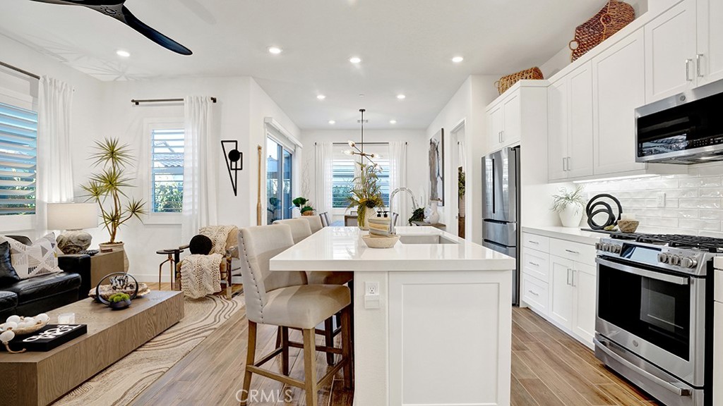 The kitchen is the heart of the home and this stunning chef's kitchen is centrally located. - 833 Sunrise Road, Rancho Mission Viejo CA 92694 - photo 1