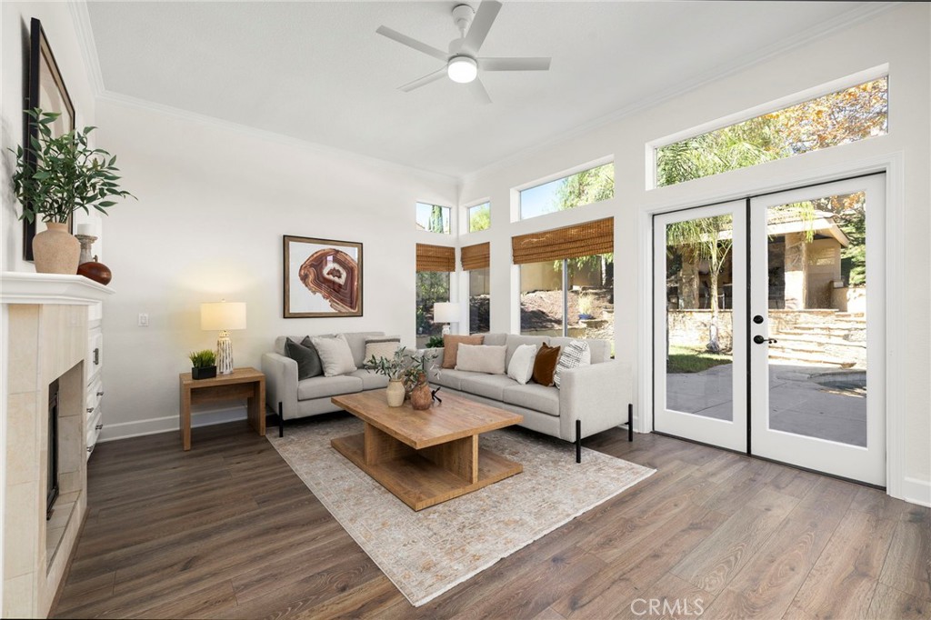 Family room with fireplace opens to the backyard - 1 Villamoura, Rancho Santa Margarita CA 92679 - photo 15