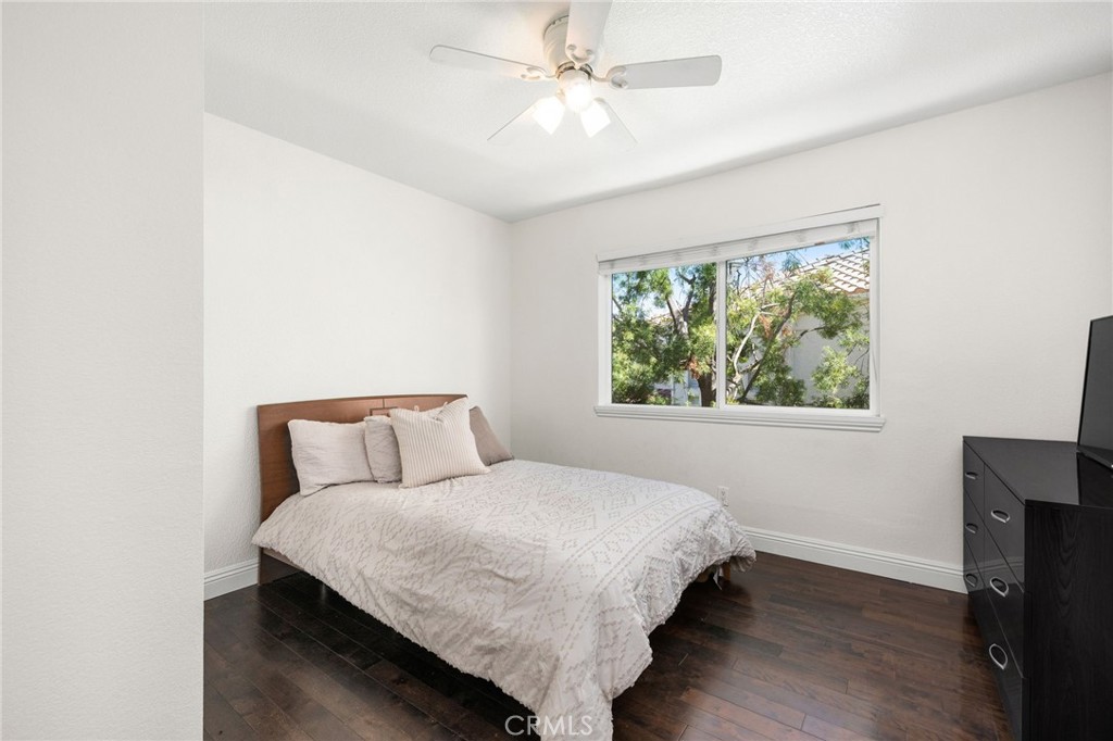Upstairs secondary bedroom with hardwood flooring - 1 Villamoura, Rancho Santa Margarita CA 92679 - photo 25