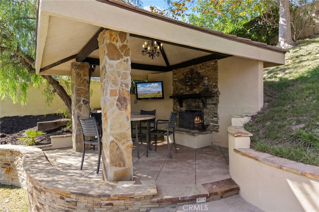 Outdoor room with fireplace - 1 Villamoura, Rancho Santa Margarita CA 92679 - photo 29