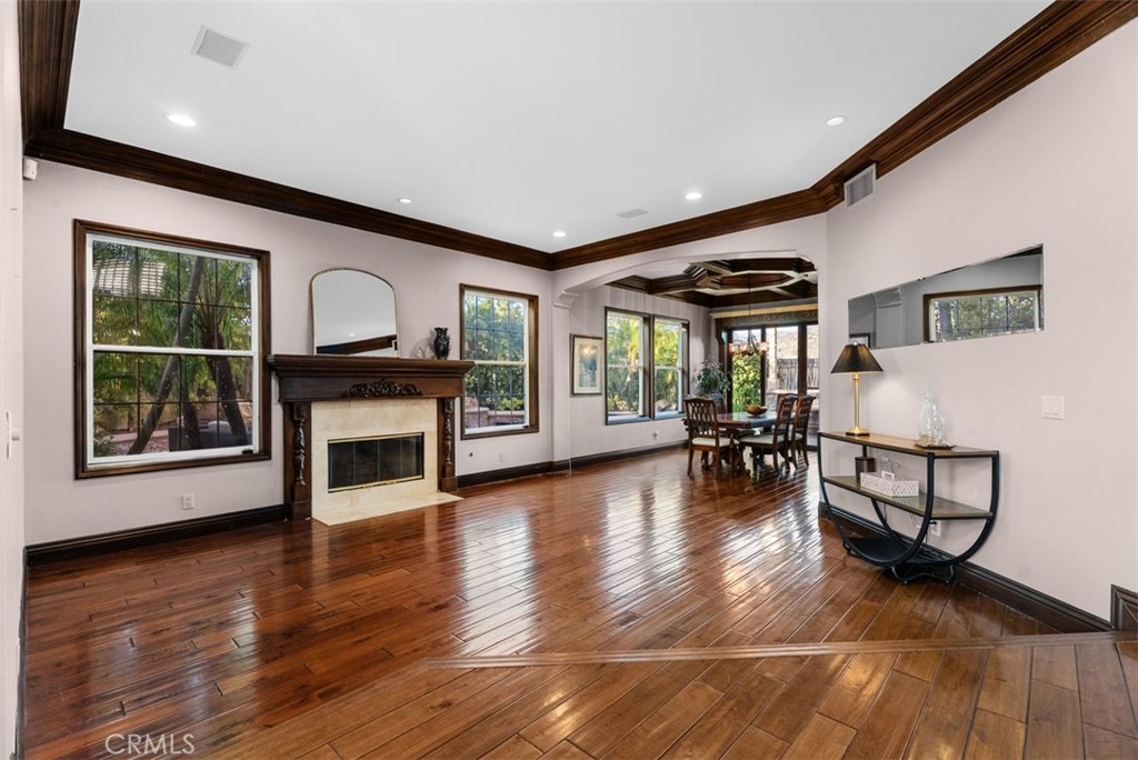 Living Room opens to Dining Room (Before Staging) - 10 Thorn Oak, Rancho Santa Margarita CA 92679 - photo 12