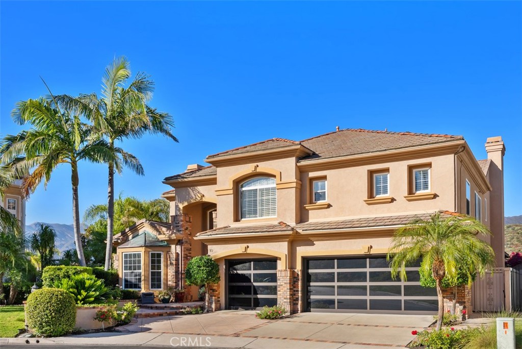 Front Exterior | 3-Car Garage - 10 Thorn Oak, Rancho Santa Margarita CA 92679 - photo 47