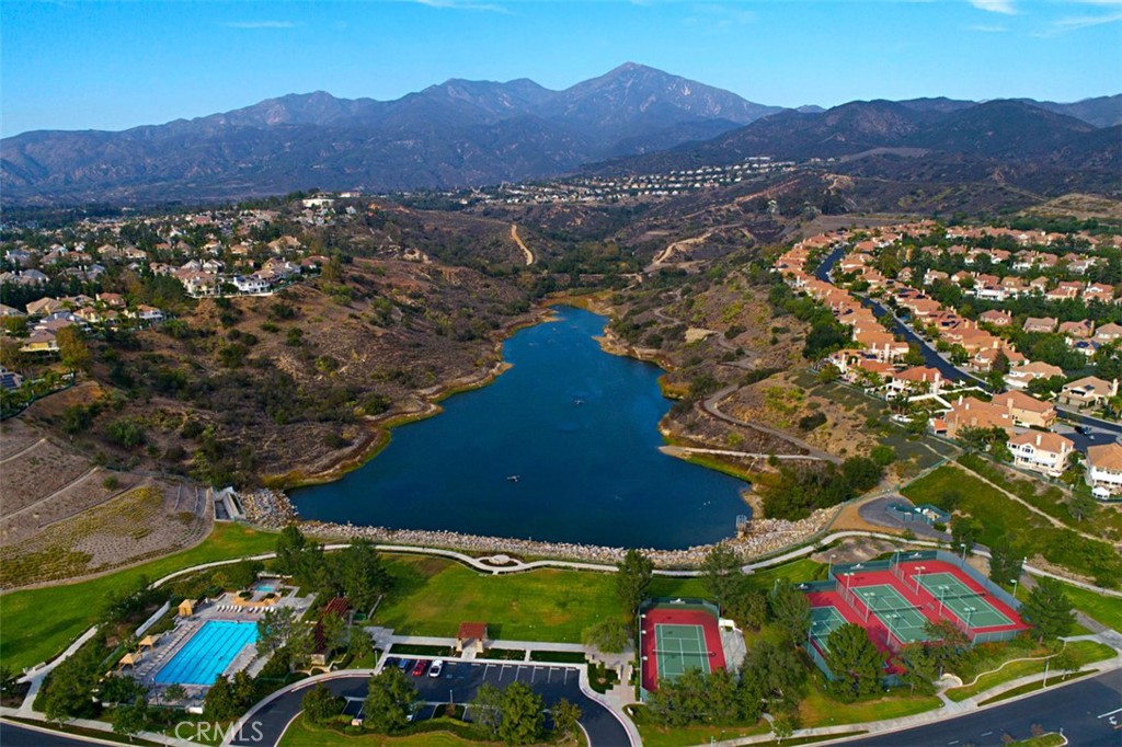 Aerial of Pool, Tennis Courts, and Reservoir - 10 Thorn Oak, Rancho Santa Margarita CA 92679 - photo 55