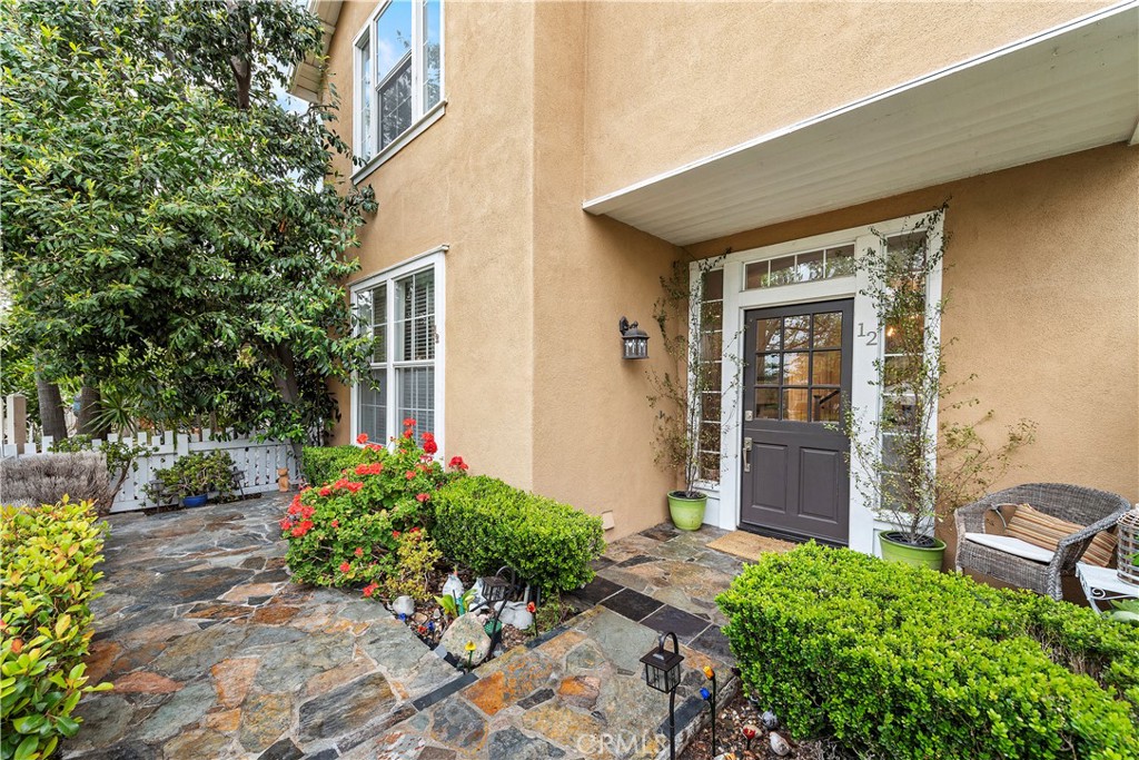 Welcome to 12 Paseo Vecino in the charming Los Paseos gated neighborhood. - 12 Paseo Vecino, Rancho Santa Margarita CA 92688 - photo 1