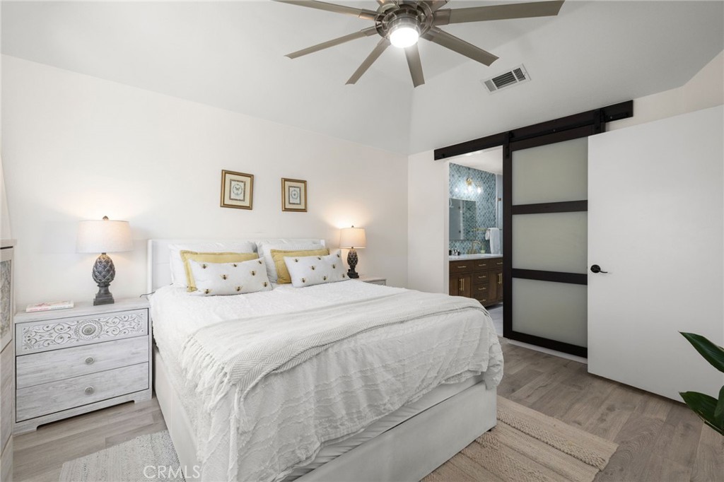Primary suite with custom privacy door leads to spa like bath - 14 Vista Lago, Rancho Santa Margarita CA 92688 - photo 19
