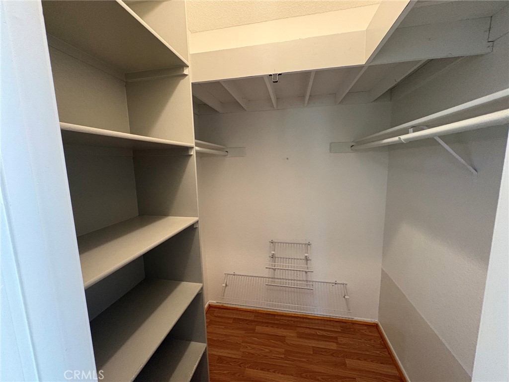 Primary Walk-In Closet - 15 Hemlock, Rancho Santa Margarita CA 92688 - photo 16