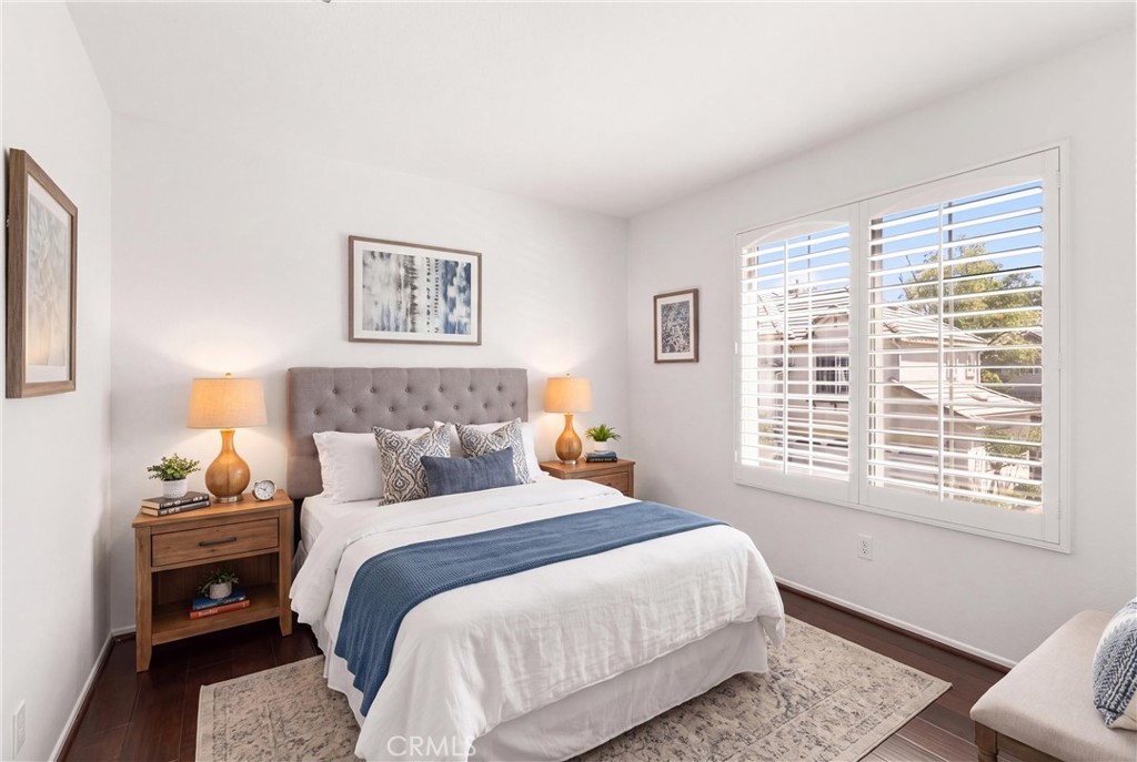 *Virtually Staged* Bright and versatile secondary bedroom with abundant natural light, plantation shutters, and engineer - 15 Poppyfield, Rancho Santa Margarita CA 92688 - photo 27