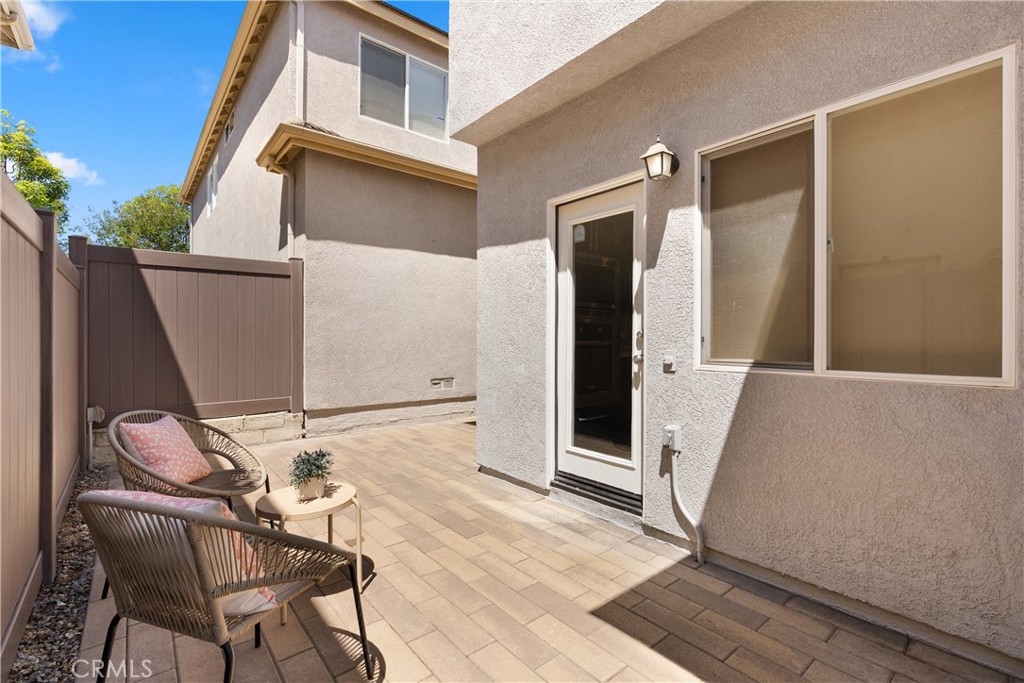 Enjoy seamless indoor outdoor living with a private patio just off the kitchen, providing the perfect setting for mornin - 15 Poppyfield, Rancho Santa Margarita CA 92688 - photo 30