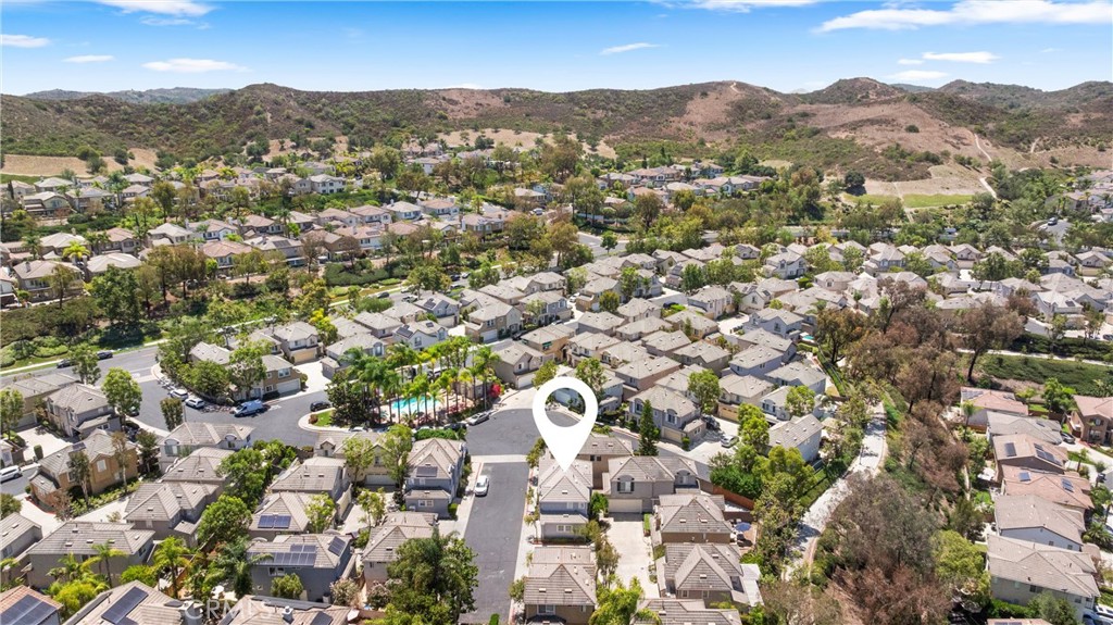 Nestled against a backdrop of beautiful open space and rolling hills, the neighborhood offers a tranquil setting with co - 15 Poppyfield, Rancho Santa Margarita CA 92688 - photo 39