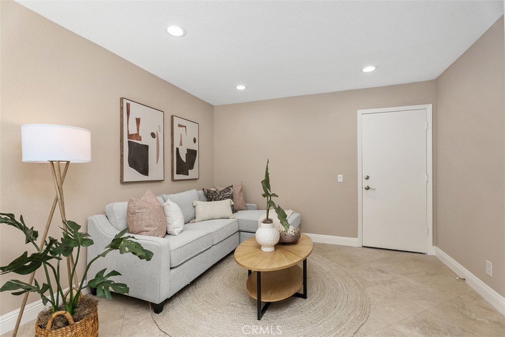 Travertine flooring downstairs - 16 Crucillo, Rancho Santa Margarita CA 92688 - photo 15
