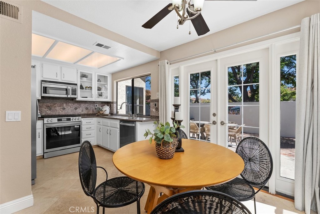 French doors to outdoor living space - 16 Crucillo, Rancho Santa Margarita CA 92688 - photo 17