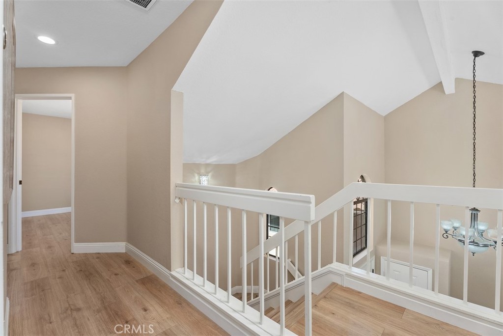 Wood laminate flooring upstairs - 16 Crucillo, Rancho Santa Margarita CA 92688 - photo 21