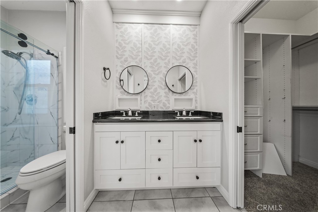 Primary Bedroom Ensuite - bathroom - dual vanity and walk in closet - 17 Calle De Los Ninos, Rancho Santa Margarita CA 92688 - photo 23