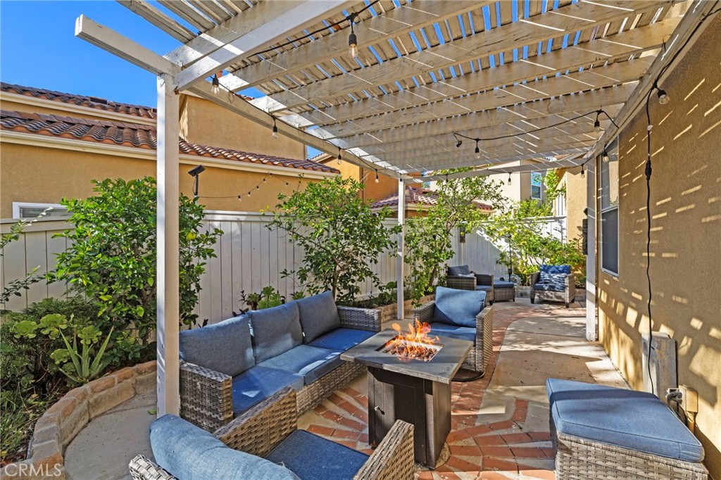 backyard wraps around with fountain and fruit trees - 19 Calle De Suenos, Rancho Santa Margarita CA 92688 - photo 2