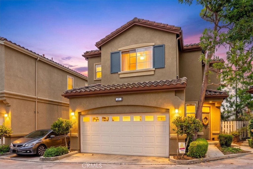 Front exterior daytime view highlighting elevation and entry - 21 Calle De Las Sonatas, Rancho Santa Margarita CA 92688 - photo 1
