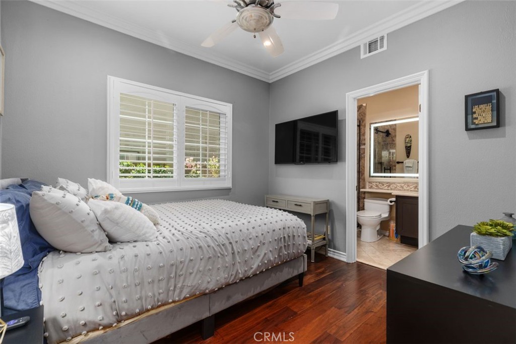 This generously sized main level bedroom with walk-in closet is ideal for guests or multigenerational living and provide - 21792 Hermosa Lane, Rancho Santa Margarita CA 92679 - photo 21