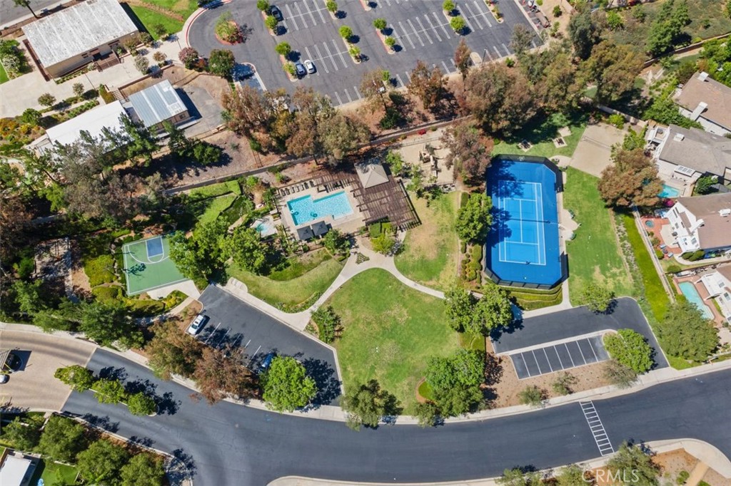 Showcasing the outstanding Rancho Cielo community amenities including a sparkling pool and spa, tennis court, basketball - 21792 Hermosa Lane, Rancho Santa Margarita CA 92679 - photo 49