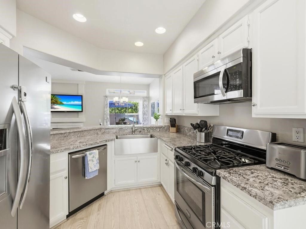 Beautiful kitchen which opens to the family room and dining area. - 23 Paseo Estrellas, Rancho Santa Margarita CA 92688 - photo 1