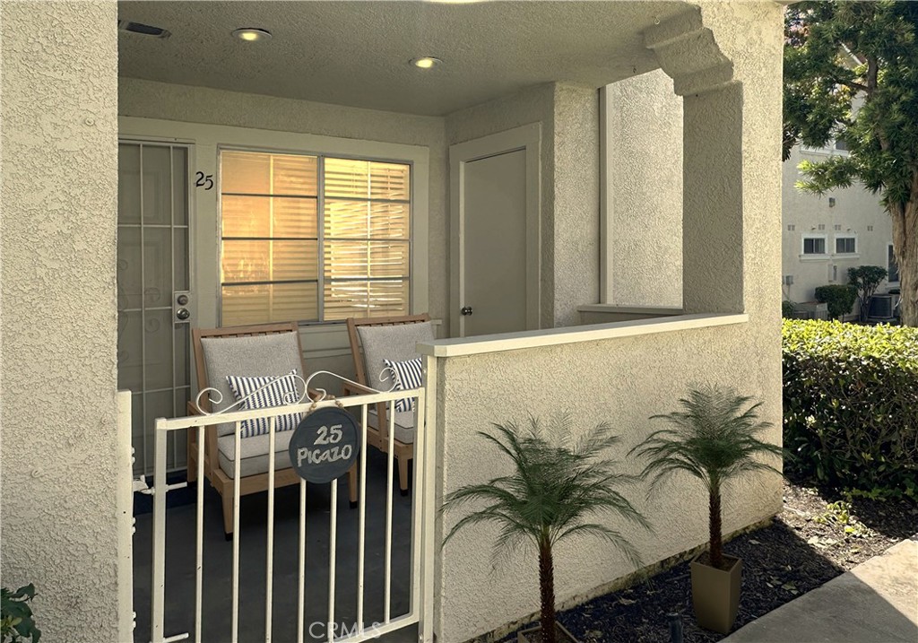 Welcome home! Furniture added for visual purposes - 25 Picazo 103, Rancho Santa Margarita CA 92688 - photo 1