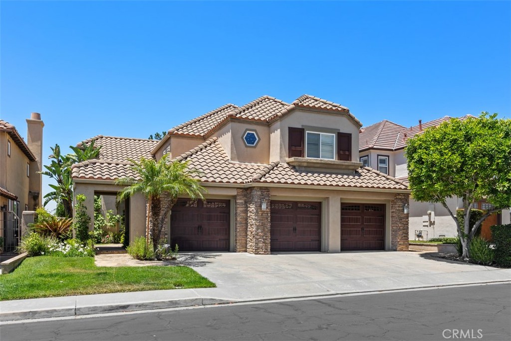 Front Exterior | 3-Car Garage - 27 Glen Echo, Rancho Santa Margarita CA 92679 - photo 1