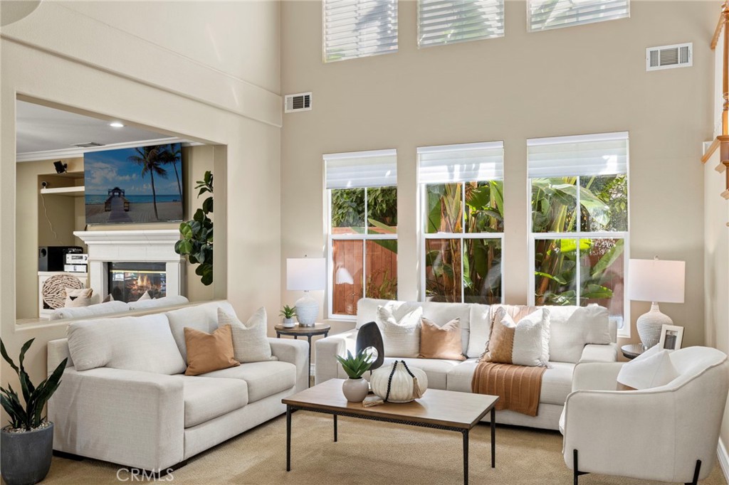 Thoughtful details include crown molding, plantation shutters, dual-pane windows, and recessed lighting. - 30 Acanthus, Rancho Santa Margarita CA 92688 - photo 3