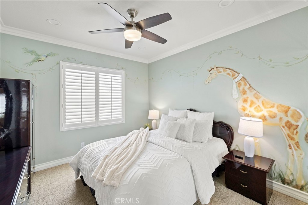 Additional guest bedroom located upstairs. - 30 Acanthus, Rancho Santa Margarita CA 92688 - photo 28