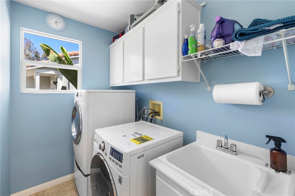 A convenient upstairs laundry room completes the second level. - 30 Acanthus, Rancho Santa Margarita CA 92688 - photo 32