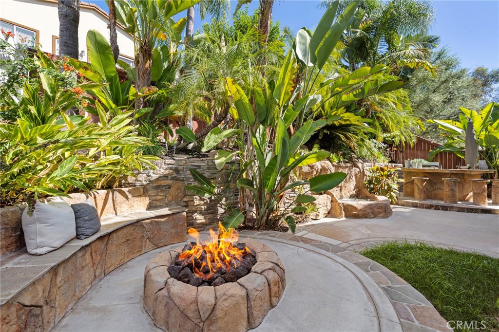 Fire pit gathering area in the backyard. - 30 Acanthus, Rancho Santa Margarita CA 92688 - photo 35