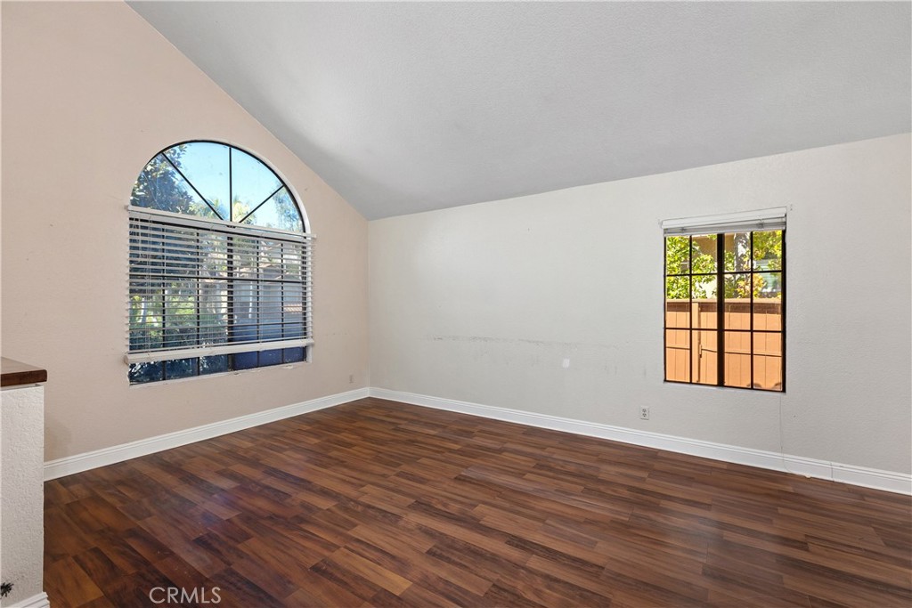 Living room with vaulted ceiling. - 30 San Bonifacio, Rancho Santa Margarita CA 92688 - photo 4