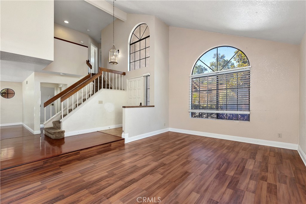 Living room looking towards entry. - 30 San Bonifacio, Rancho Santa Margarita CA 92688 - photo 5